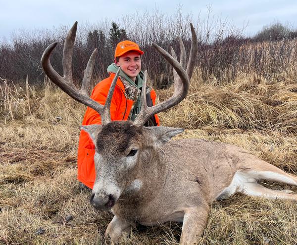 Young Wisconsin Hunter Tags out on a Manitoba Monster Whitetail